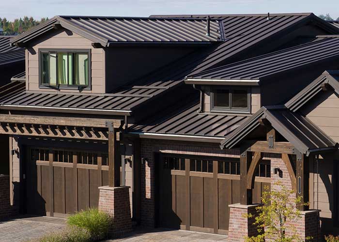 Black standing seam metal roof.